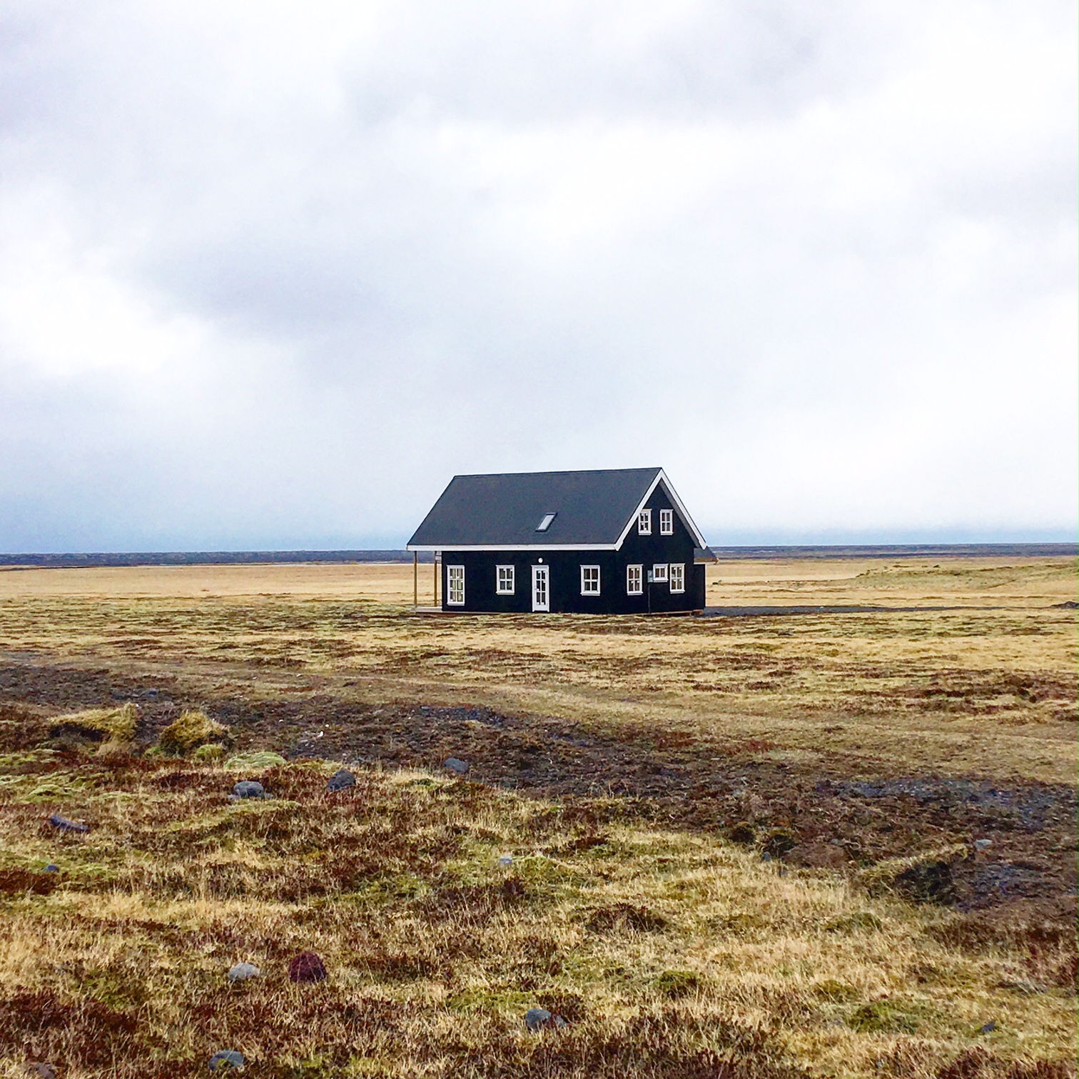 Remote black house on the way to Vik
