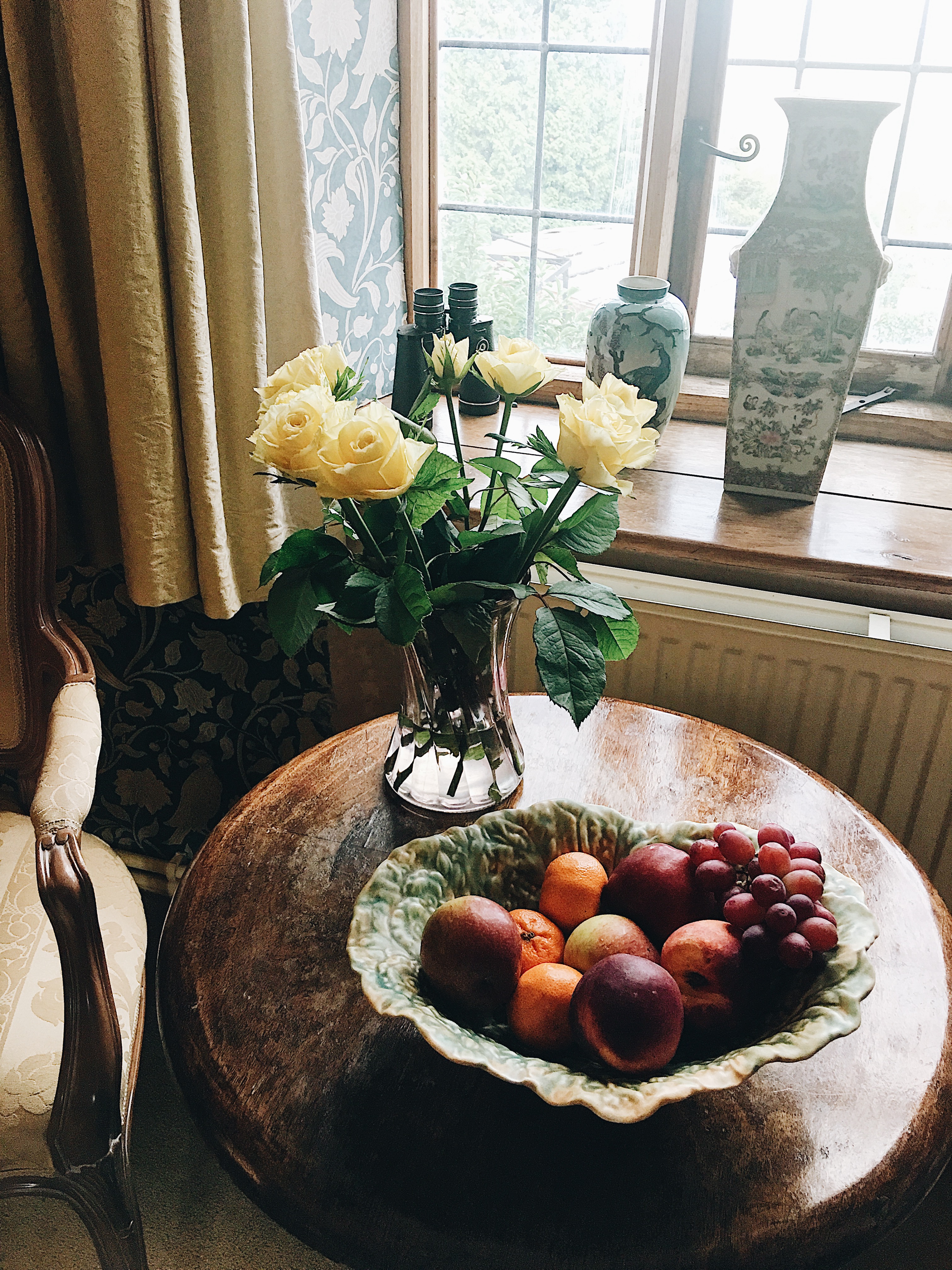 Fresh fruit bowl and floral arrangements