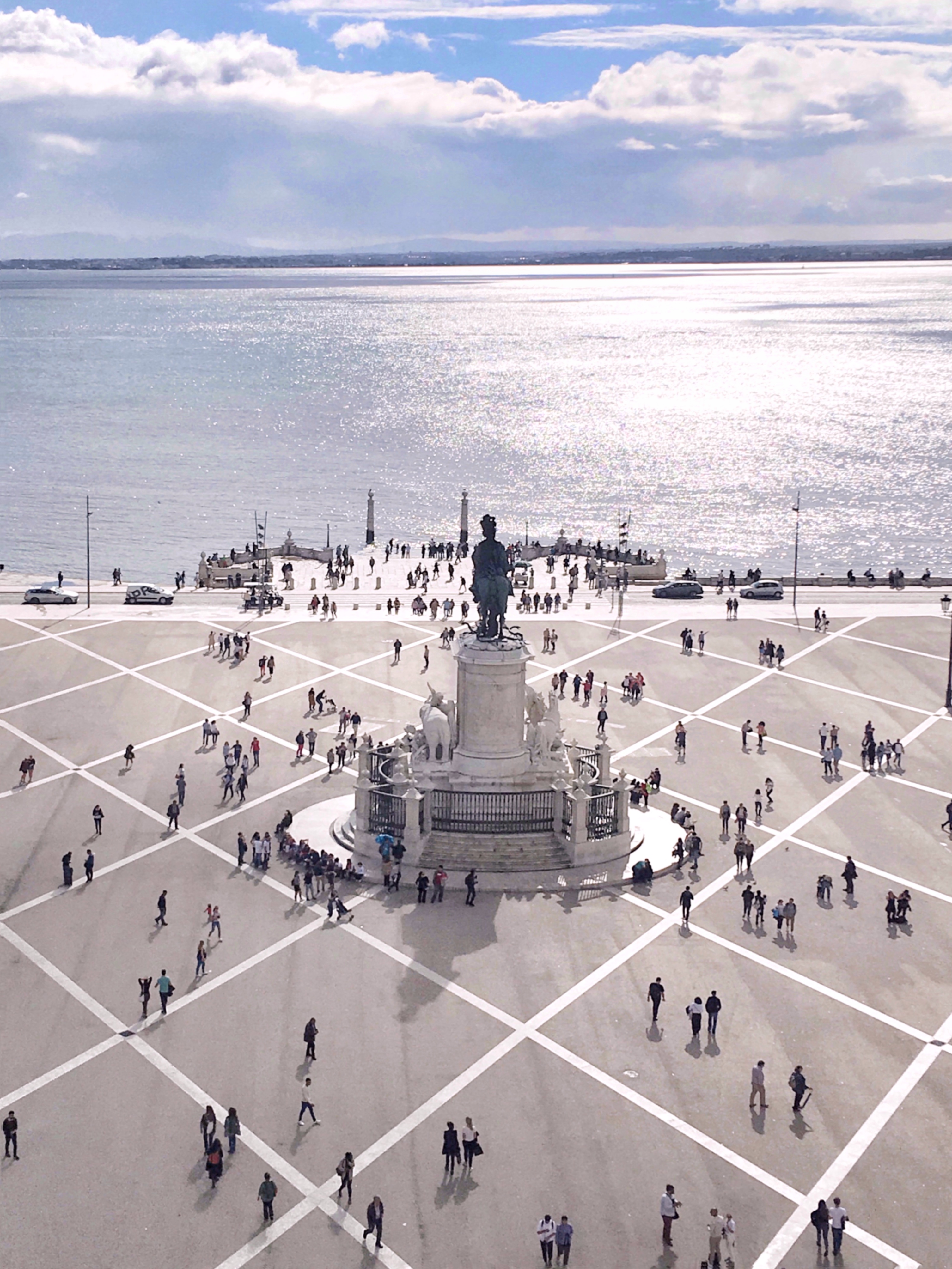 People strolling through Commercial Square Lisbon