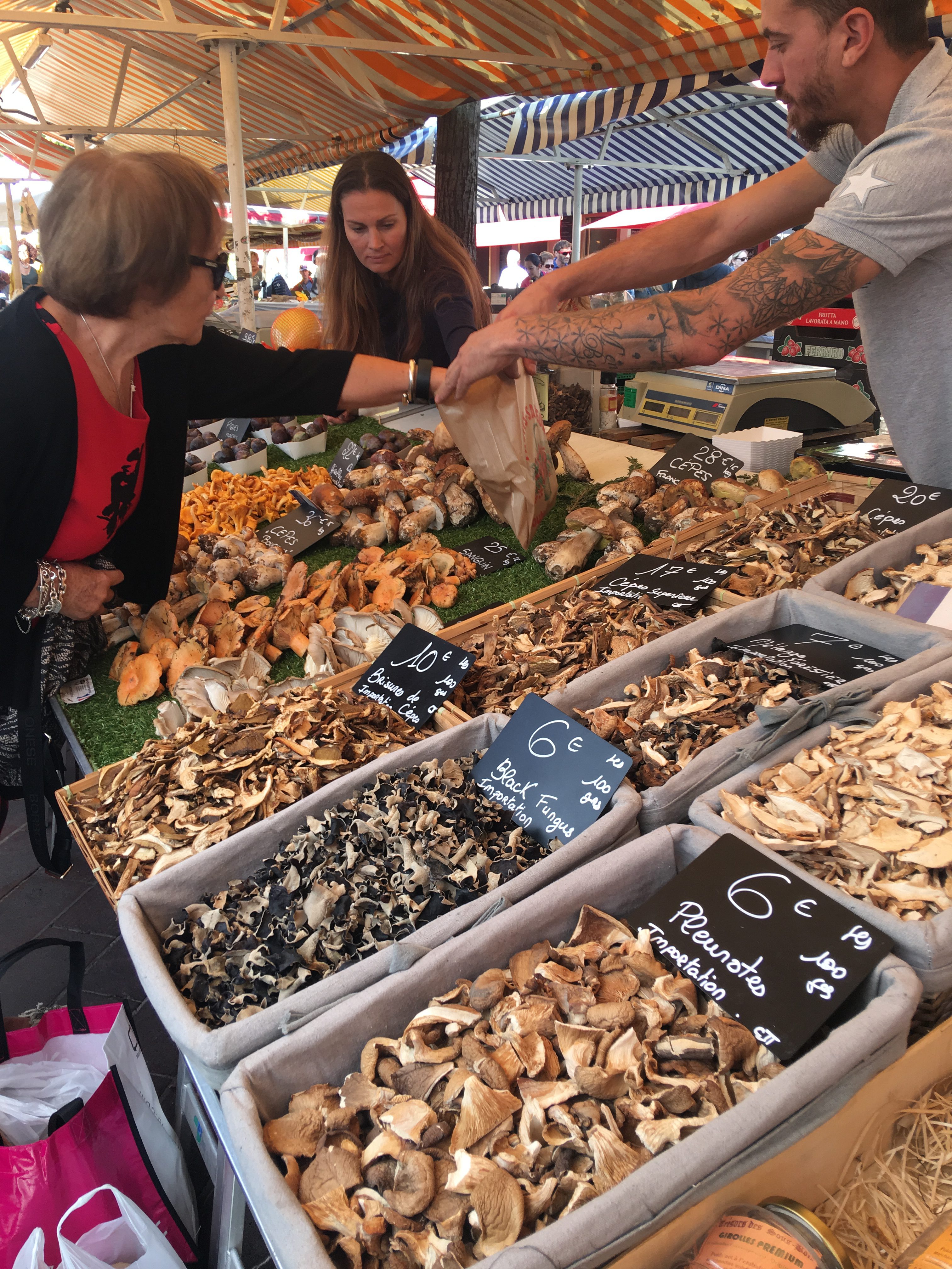 Locals shopping at Nice flower market