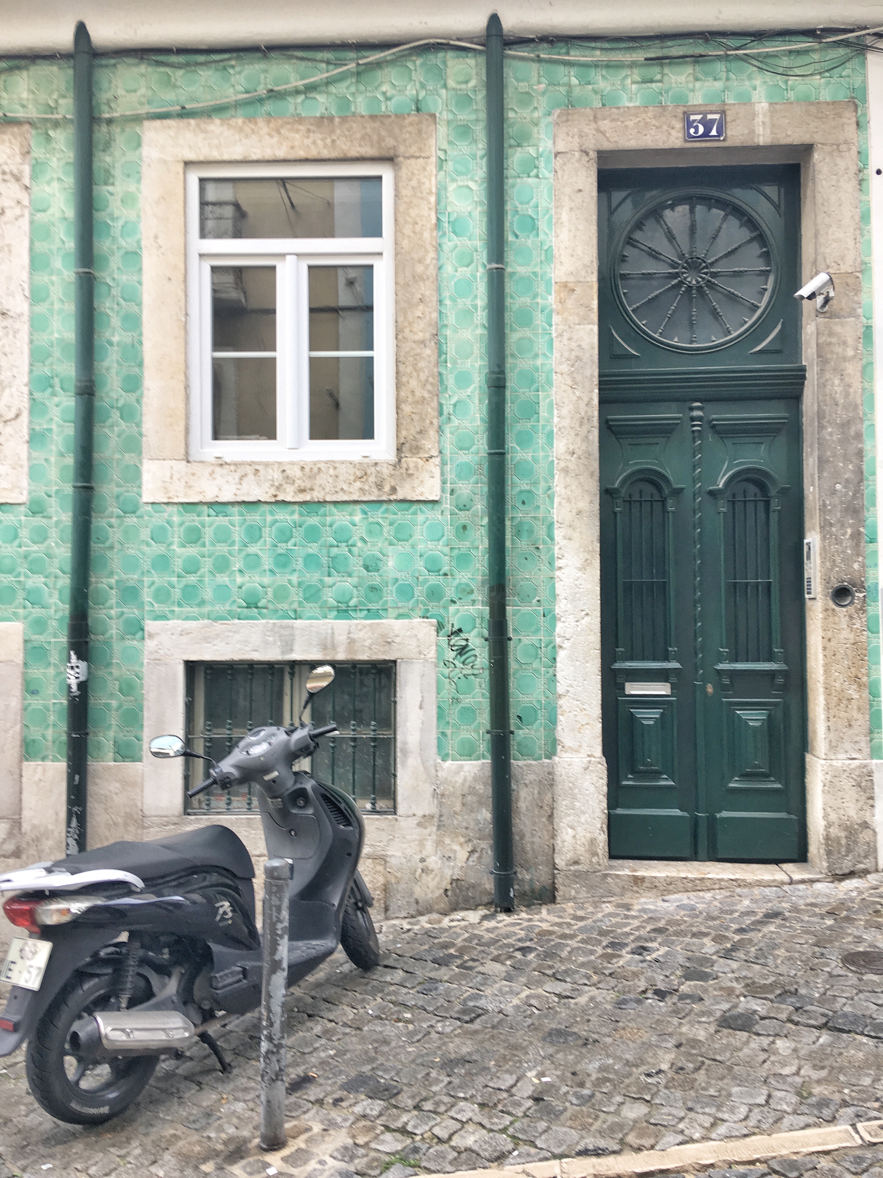 Turquoise tiled building in Bairro Alto Lisbon