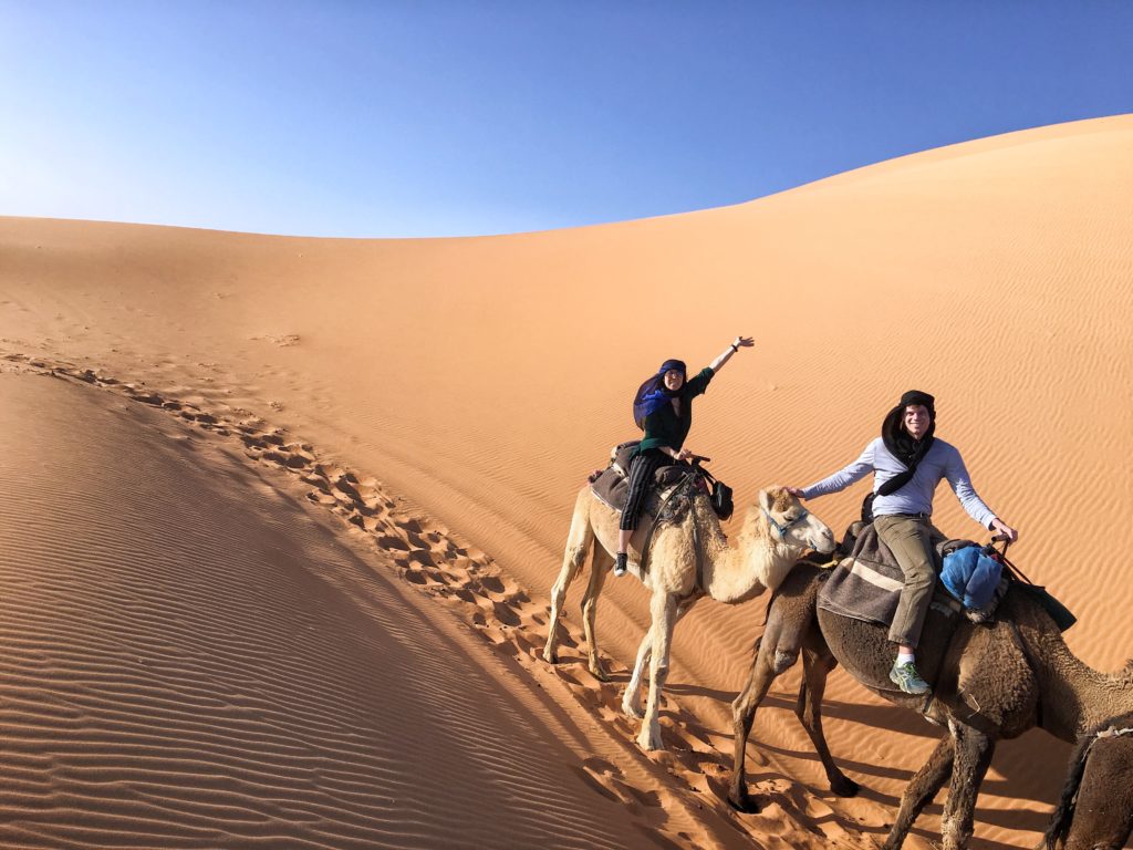 Camel riding in the Sahara